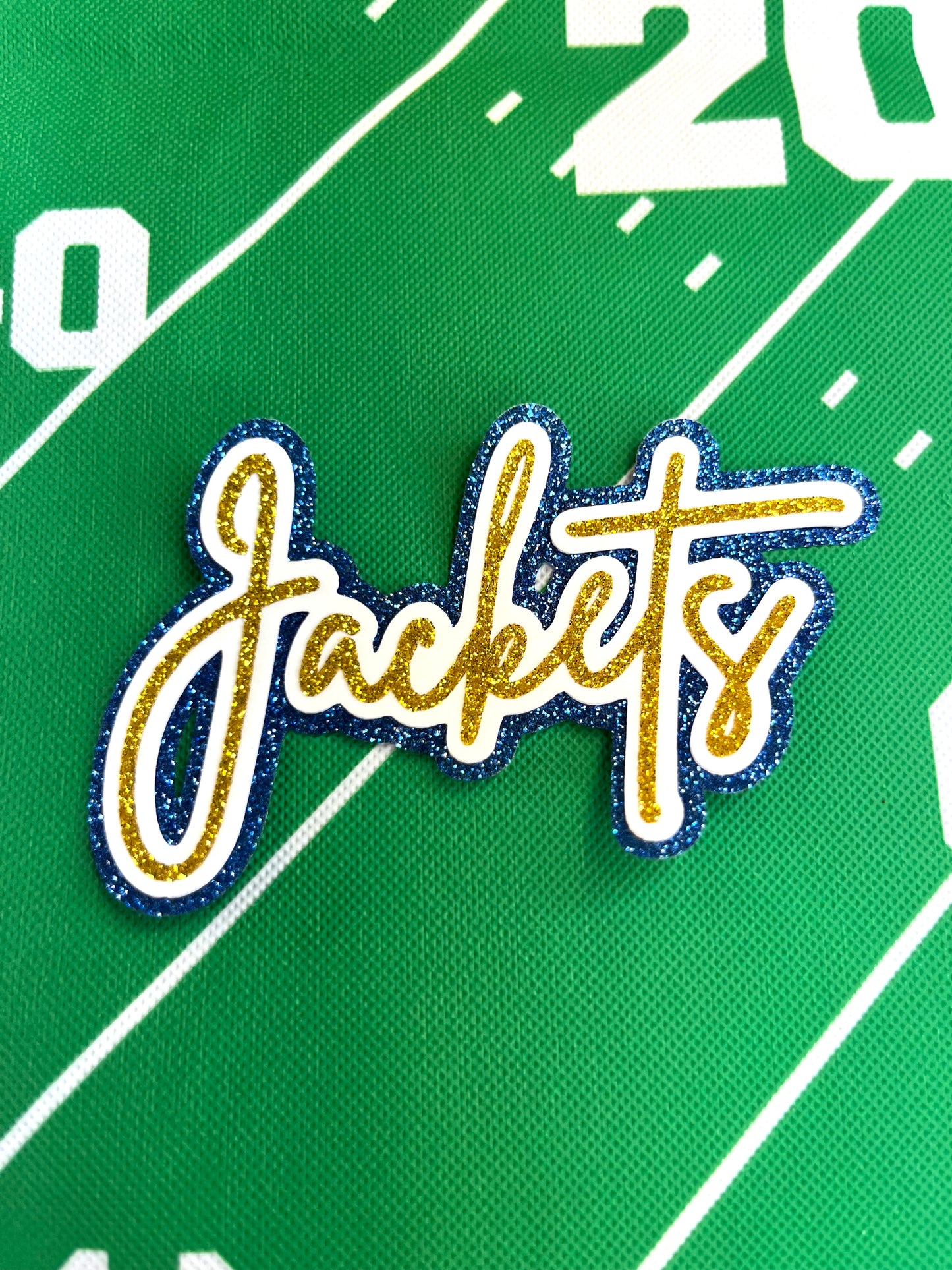 FIVE (5) mascot iron on patches Brittany font