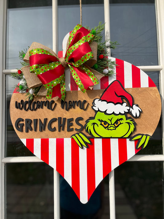 Green guy welcome home door hanger